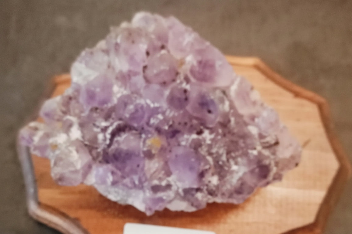 Amethyst,large piece on Wooden Base