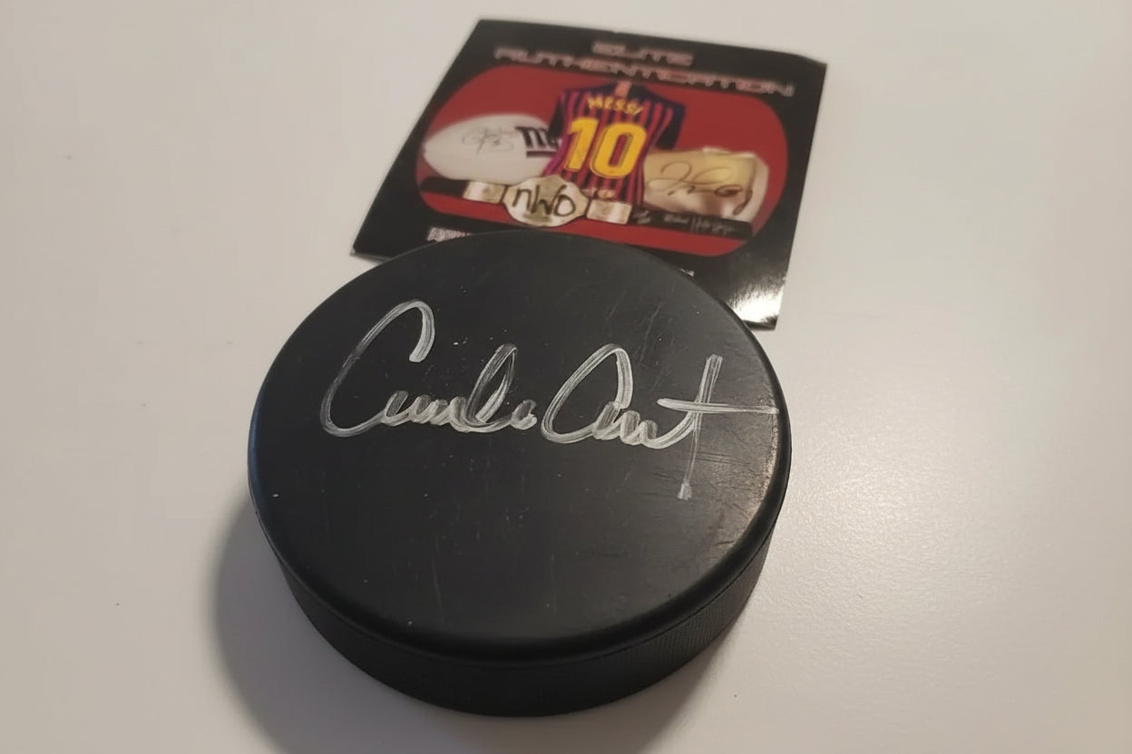 Emilio Estevez signed Anaheim Mighty Ducks hockey puck with authentication card