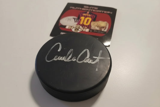 Emilio Estevez signed Anaheim Mighty Ducks hockey puck with authentication card